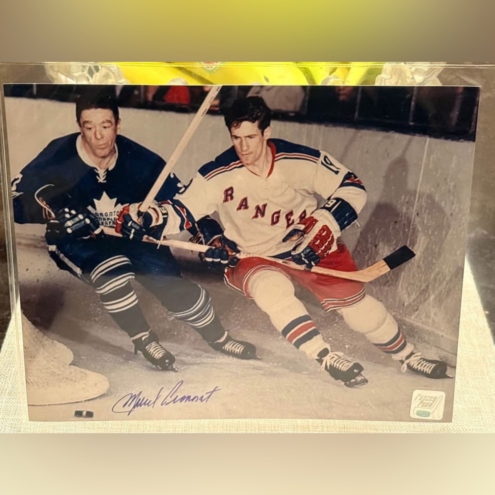 Classic Hockey Action Photograph with Red and Blue Accents